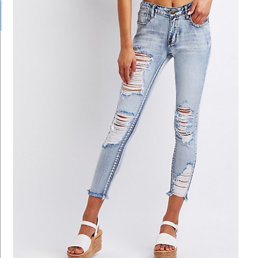 Machine destroyed denim jeans